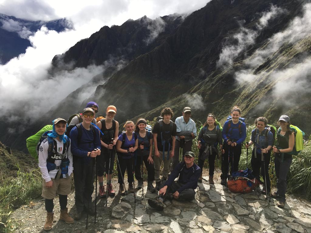 Travelers with their guide on the Inca Trail