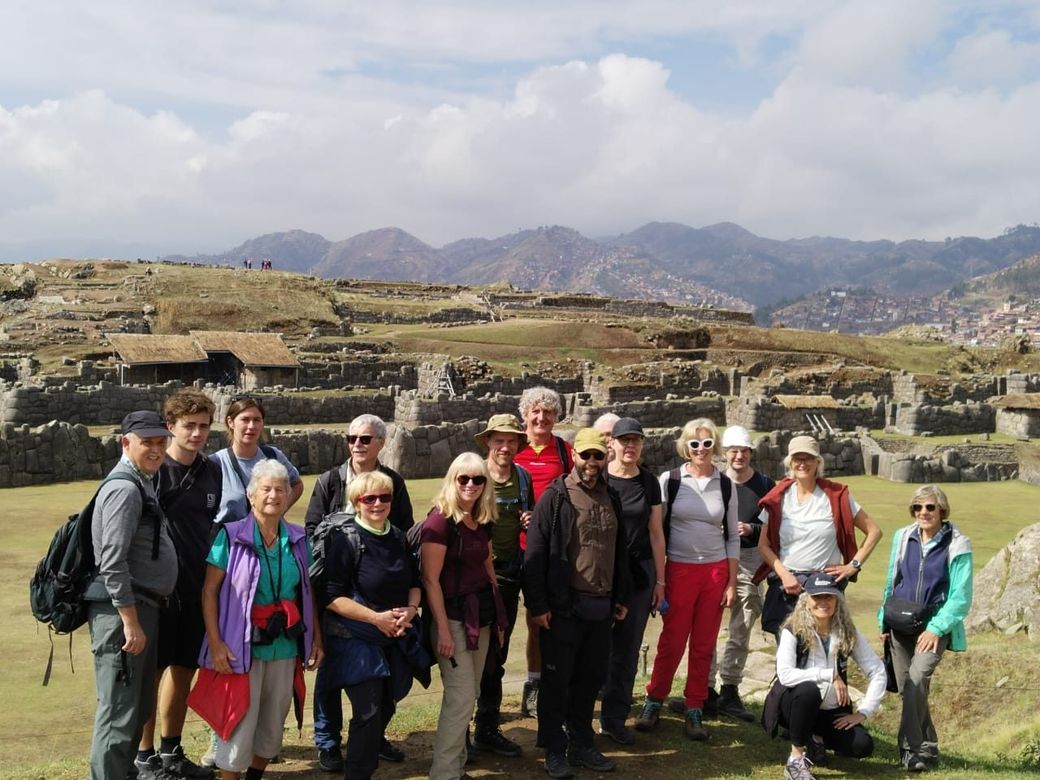 A group at the megalithic walls of Sacsayhuam&aacute;n